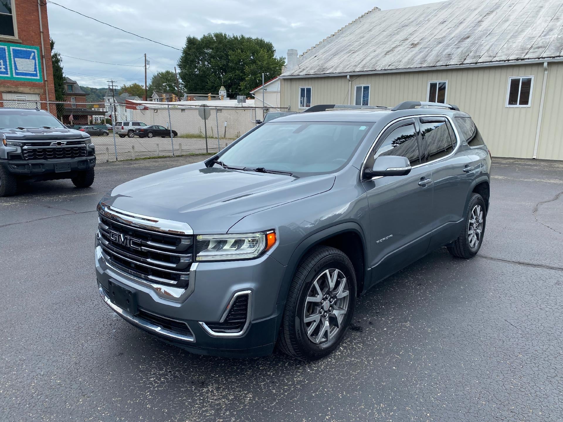 Used 2020 GMC Acadia SLE with VIN 1GKKNRLS5LZ199417 for sale in Sistersville, WV